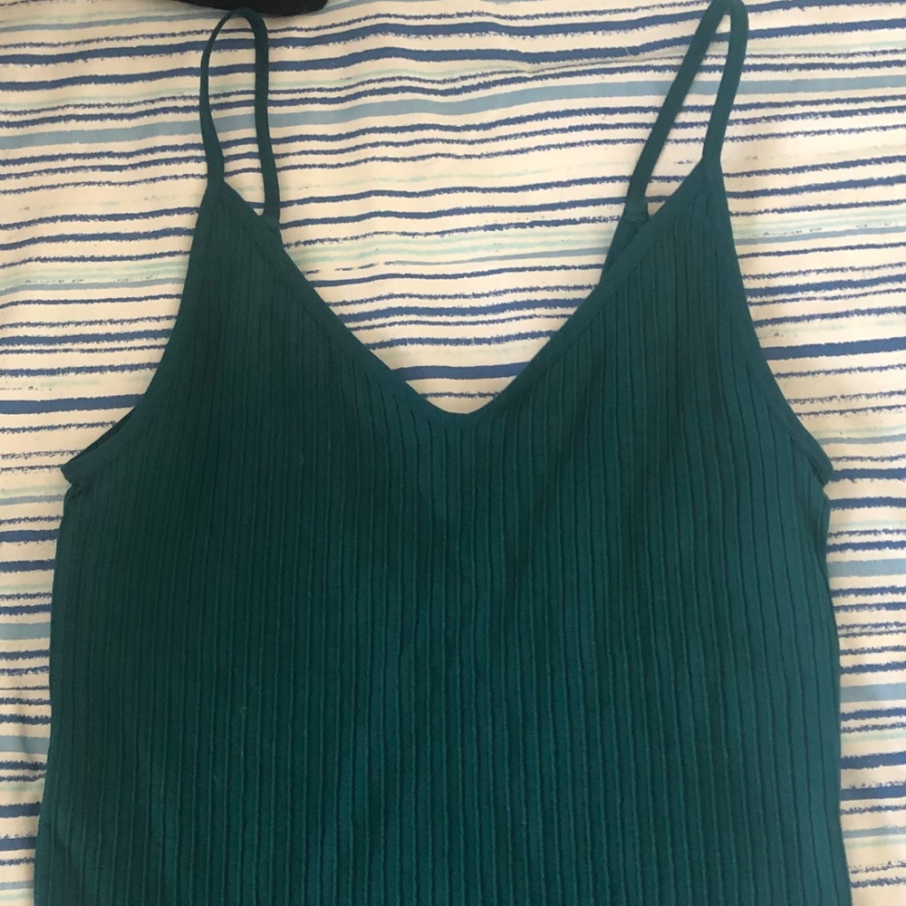 A cute crop length tank with a low v-cut back